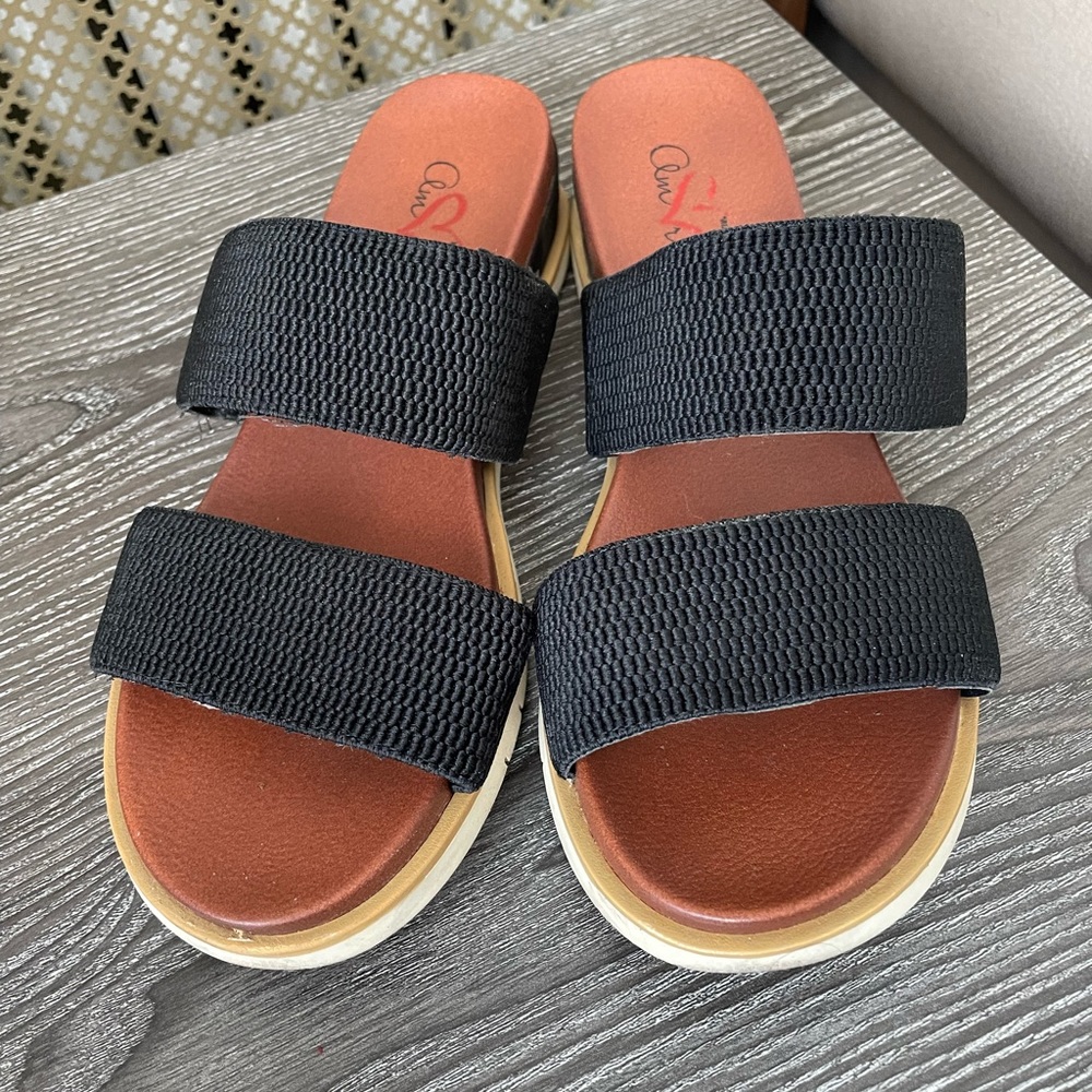 Black slip on sandals